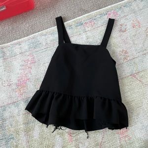 Black flowy tank top with raw hem